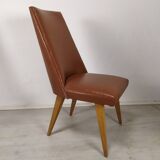 8 brown skai chairs 1950