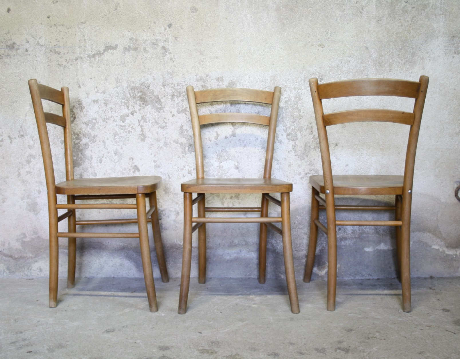 Three Luterma bistro chairs
