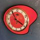 Vintage formica clock silent asymmetrical wall pendulum "Doby Matic red"