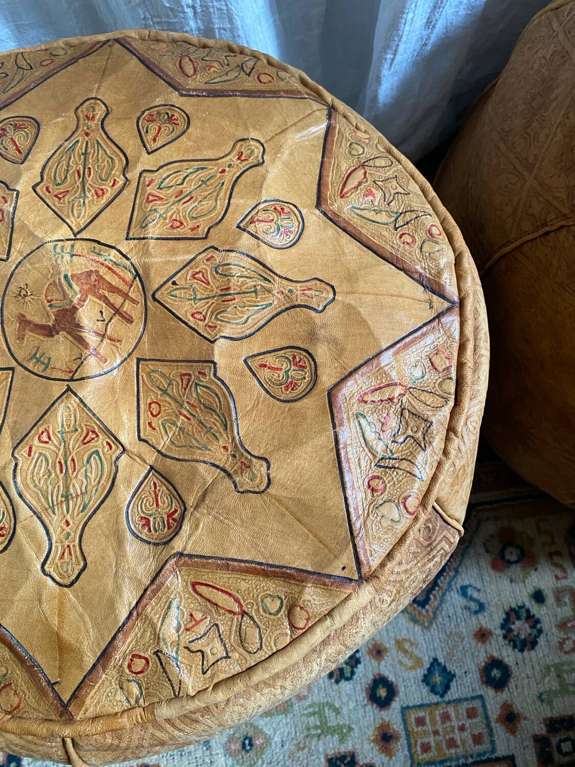 Pair of leather poufs