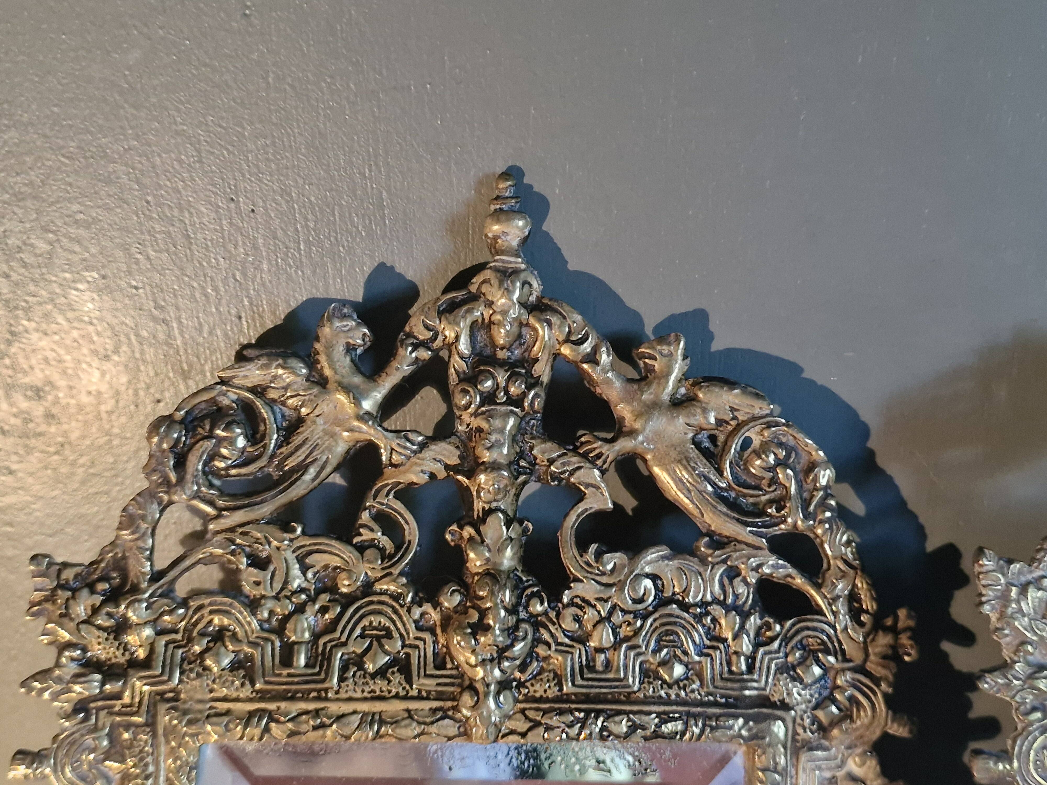 Pair of mirror sconces/candle holders in 19th-century bronze.