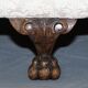 Victorian suite in damask, walnut frame, legs carved in lion's paw.