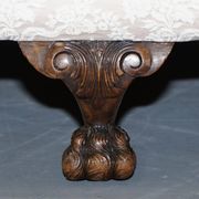 Victorian suite in damask, walnut frame, legs carved in lion's paw.