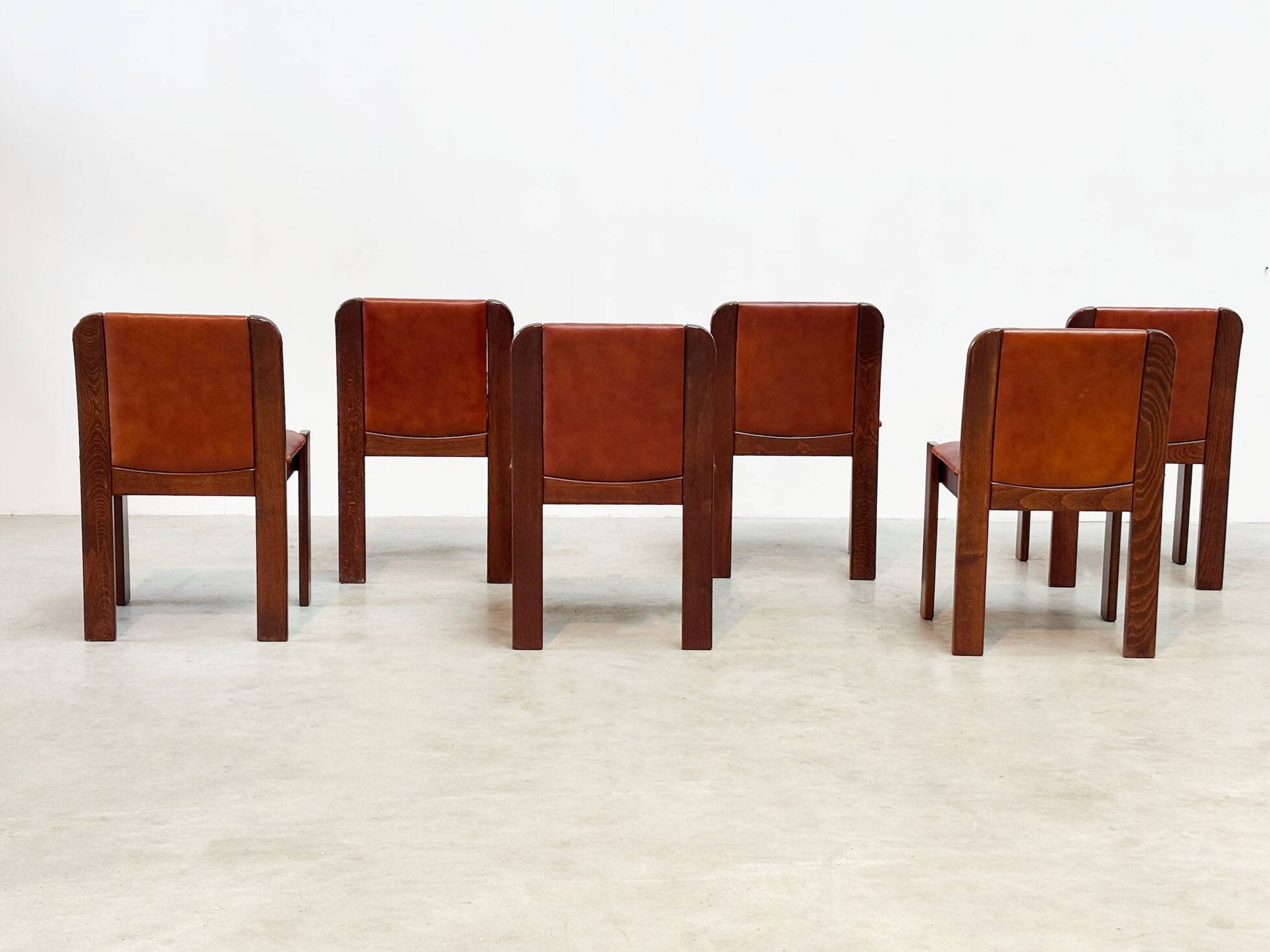 Set of six leather Italian dining chairs