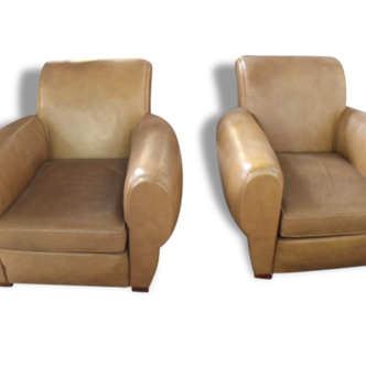 Pair of beige leather club chairs, 1970s