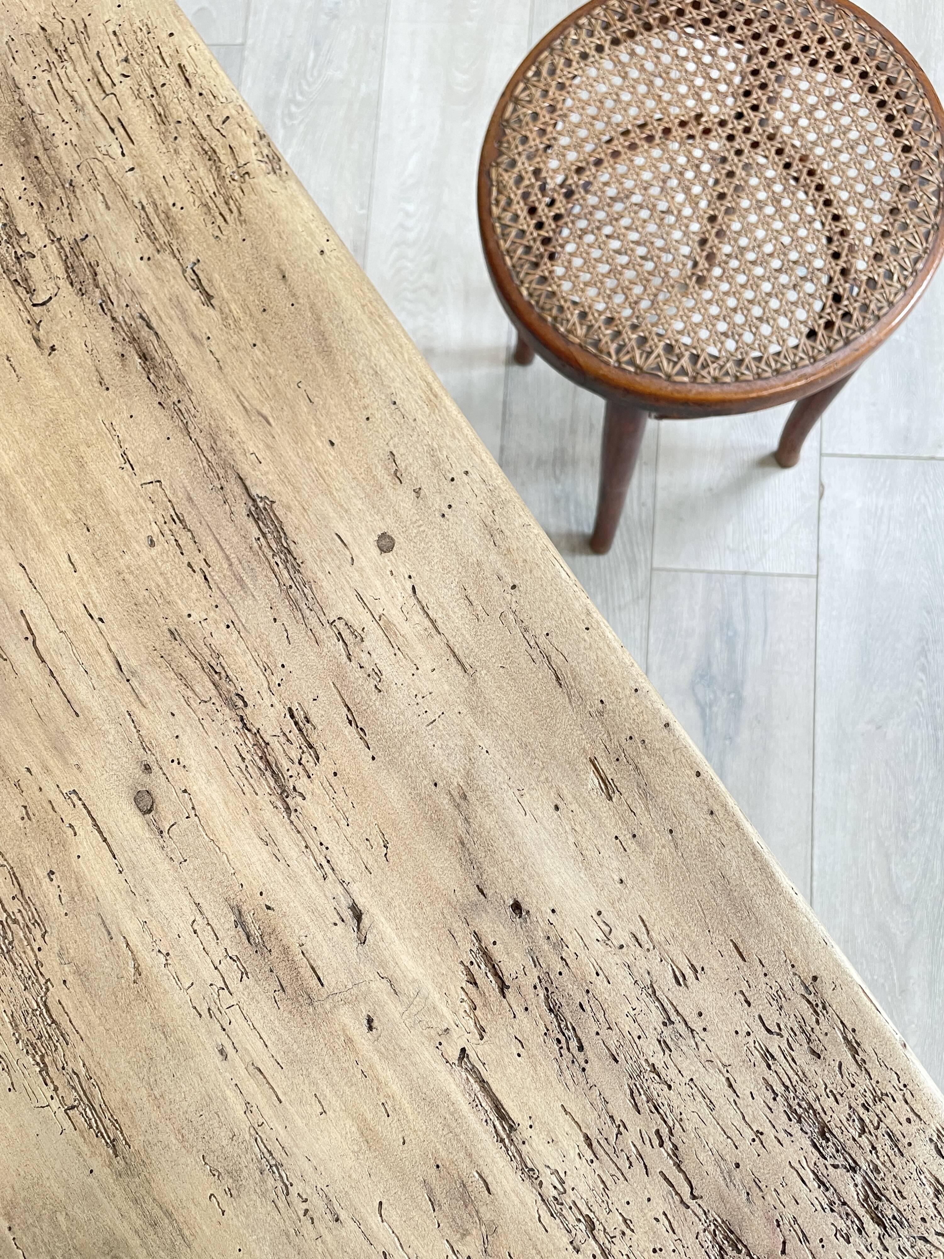 Vintage farm table with spindle legs.