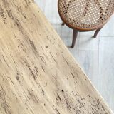 Vintage farm table with spindle legs.