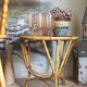 Table basse d'appoint tripode en rotin années 50