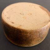 Round ashtray signed in sandstone with glazed interior