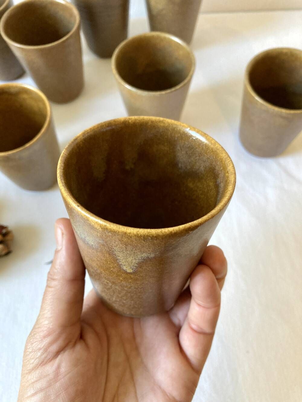 Set of 12 glazed stoneware cups, Digoin Stoneware Pots