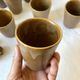 Set of 12 glazed stoneware cups, Digoin Stoneware Pots