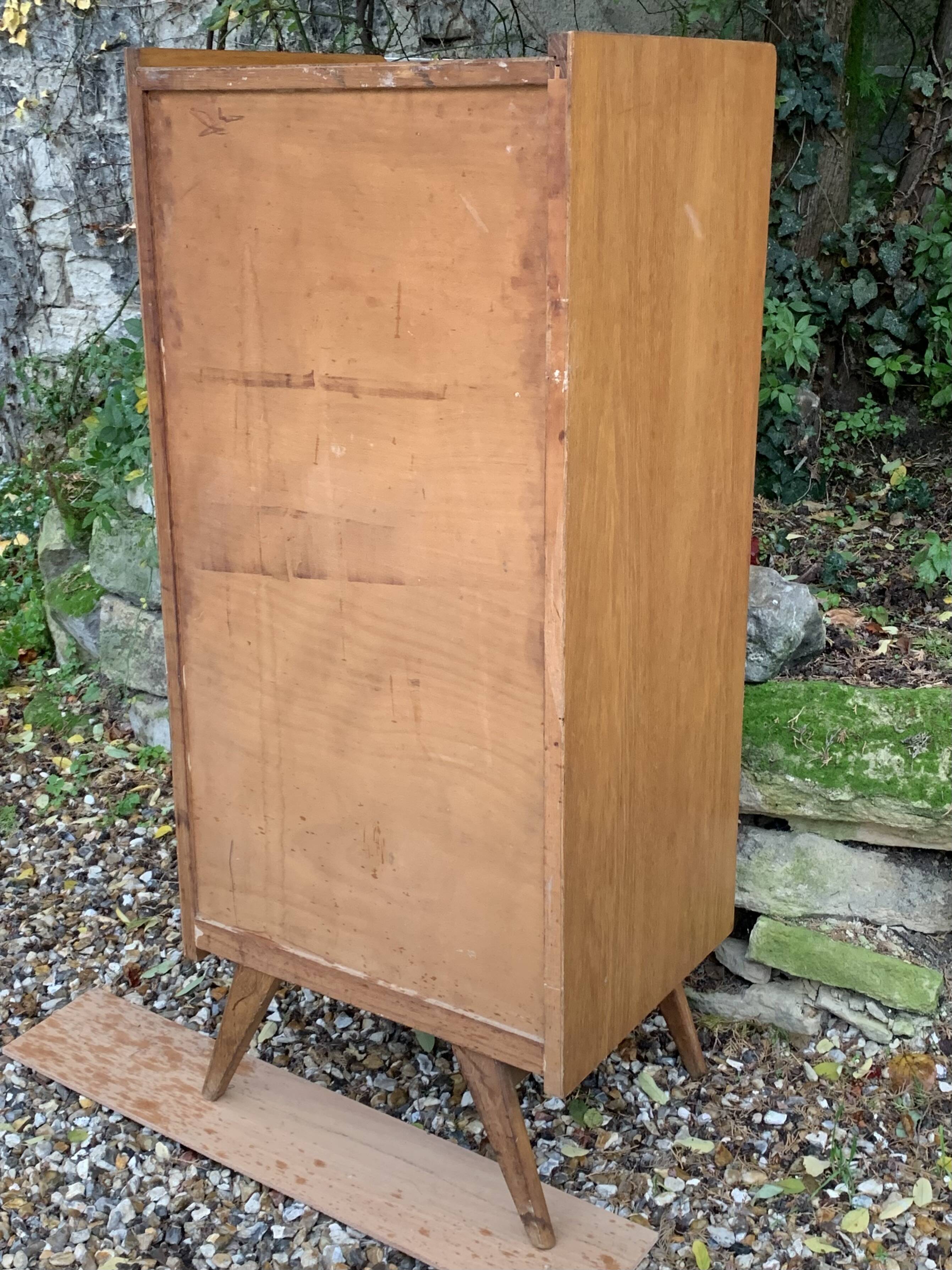 Vintage rattan chiffonier with compass feet 1950