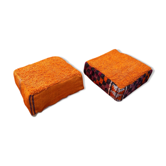 Pair of orange Moroccan wool poufs
