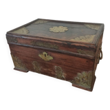 Old Indian wooden wedding chest decorated with chiseled brass plaque. India late 19th/early 20th