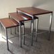 Trio of teak and chrome metal nesting tables from the 60s-70s