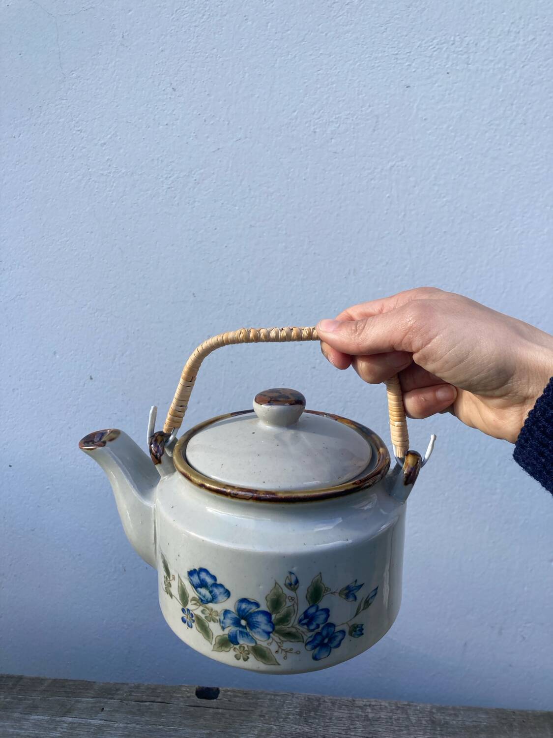 Chinese ceramic and rattan teapot