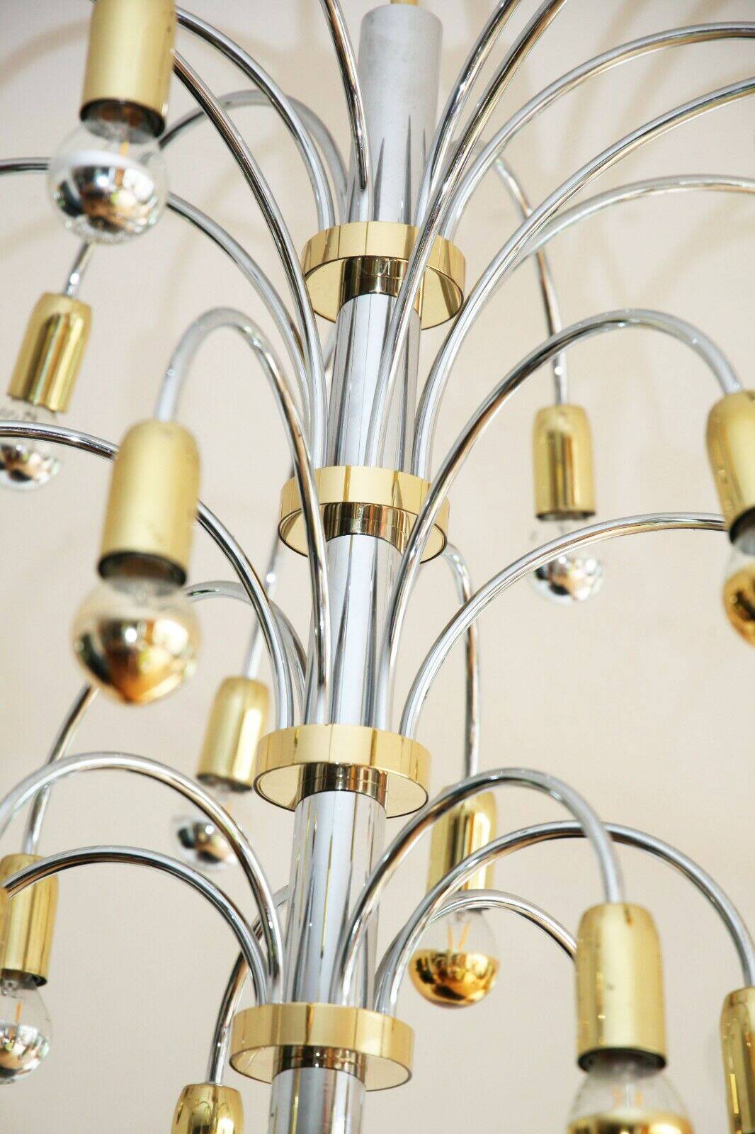 Post-modern chandelier with 24 lights in chrome and gold metal, Germany, 1970.