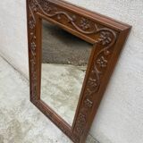 Two antique 19th century mirrors in carved Napoleon oak wood