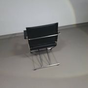 2 chaises pliantes en cuir chromé