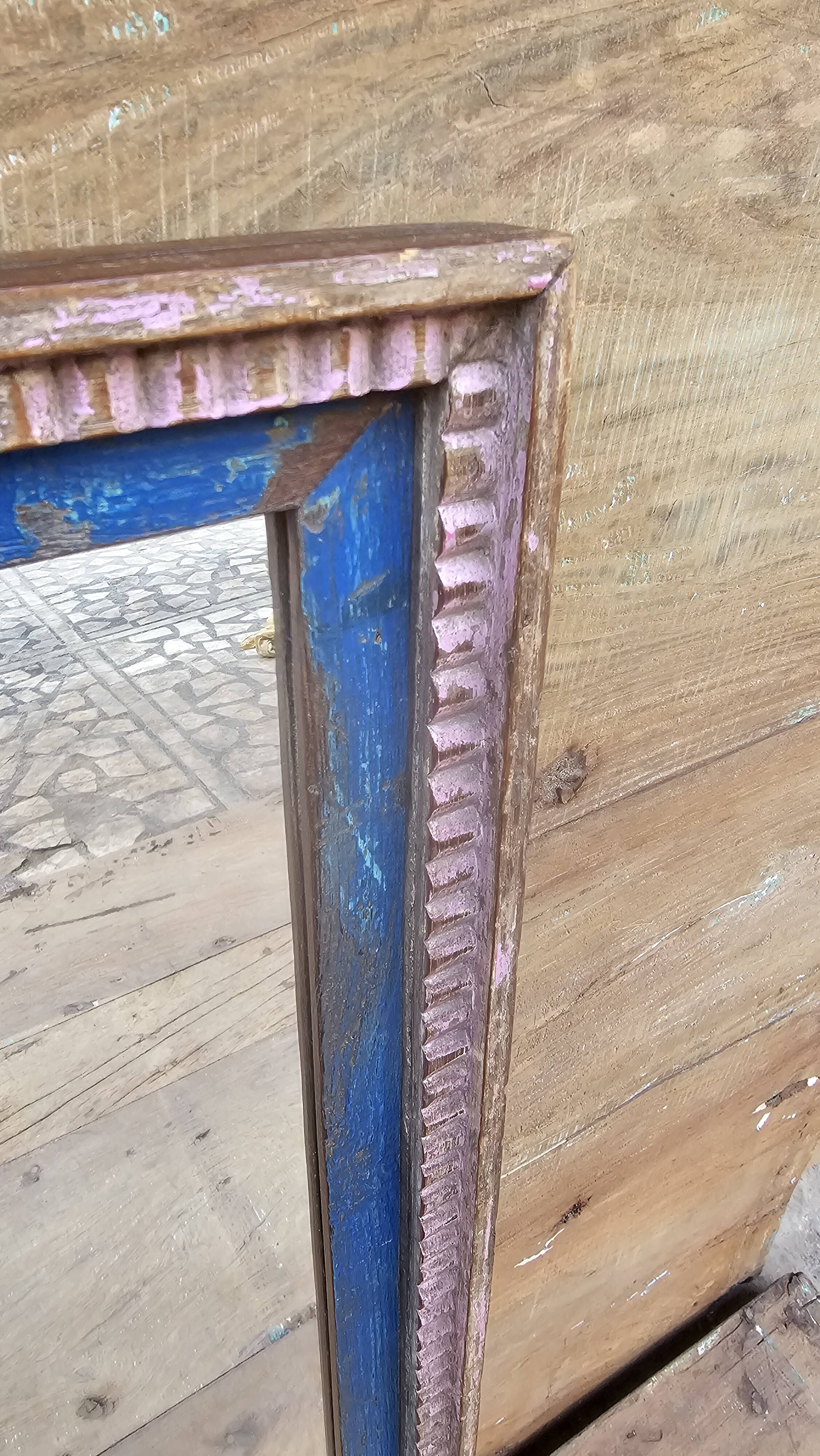 Old art deco mirror in burmese teak