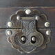 Wooden bulging treasure box