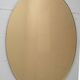 Paire de miroirs ovales italiens modernes du milieu du siècle, miroir en laiton et bronze, 70