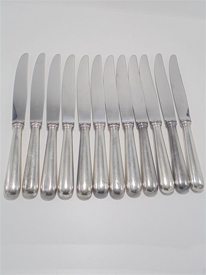 Series of 12 silver knives