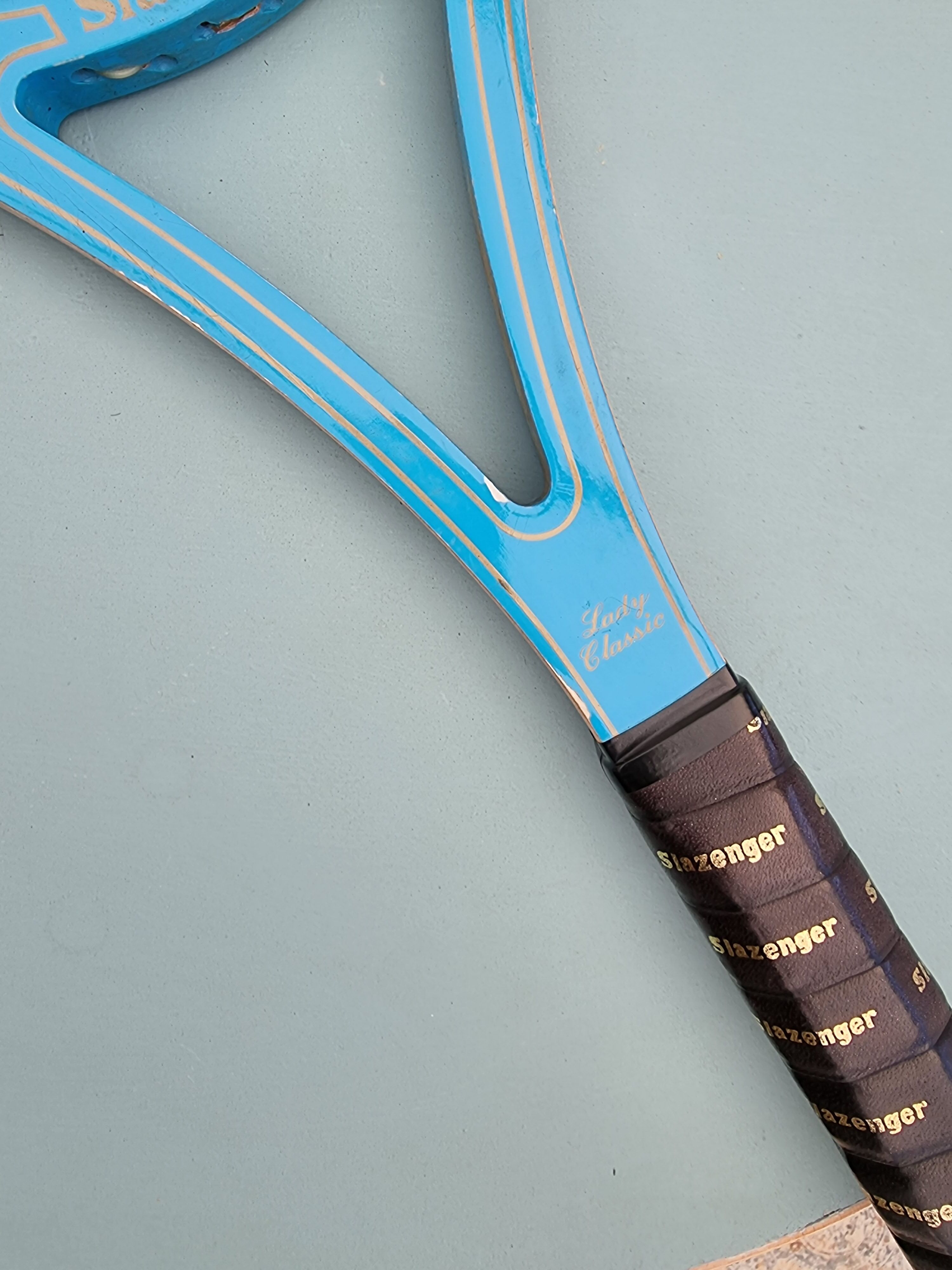 Vintage blue wooden racket