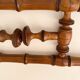 Vintage wooden wall coat rack with 4 swivel hooks from 1920