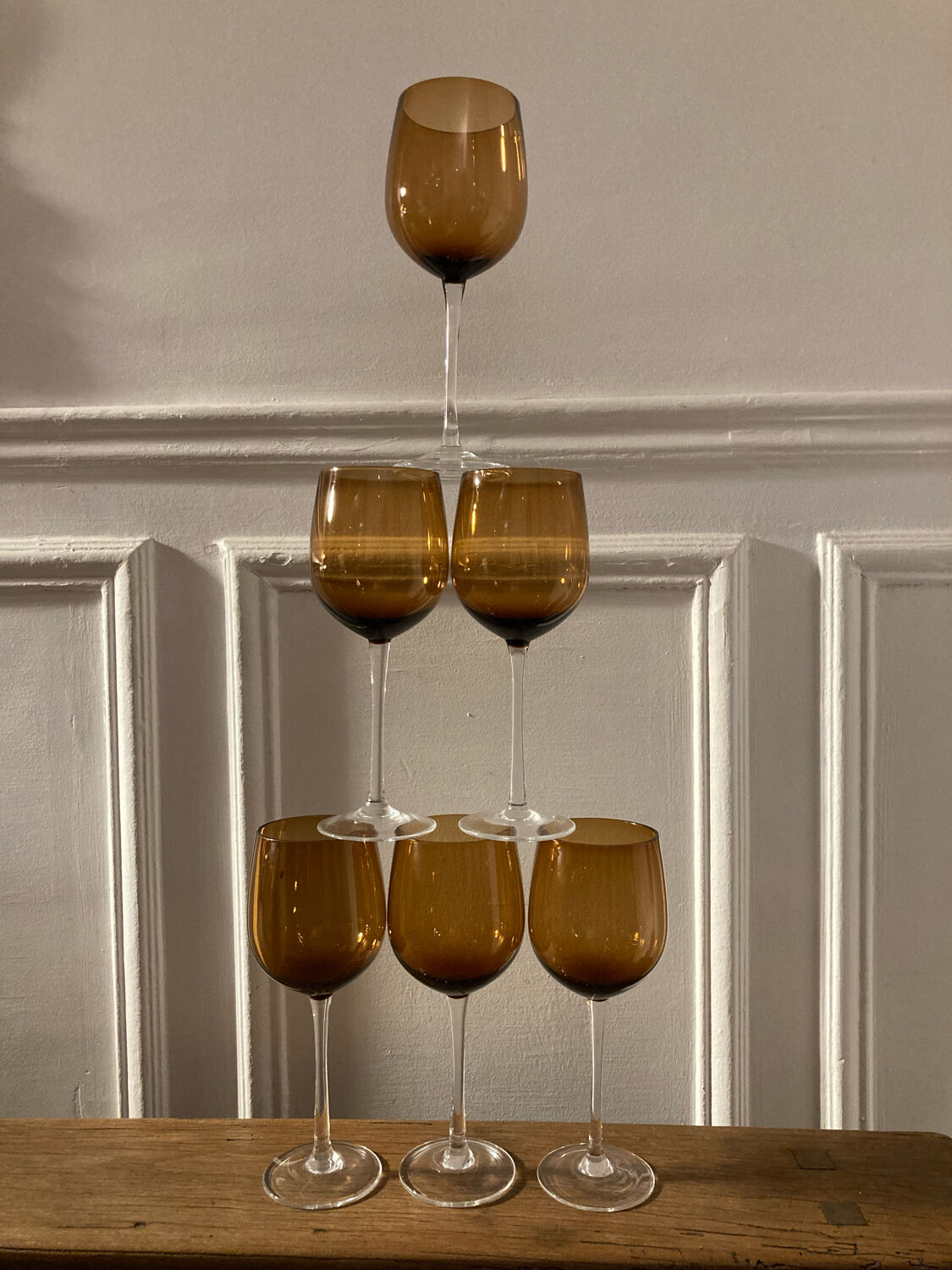 6 amber stemmed glasses