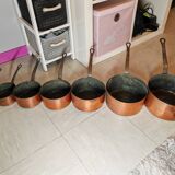 Set of 7 copper pans / brass handle