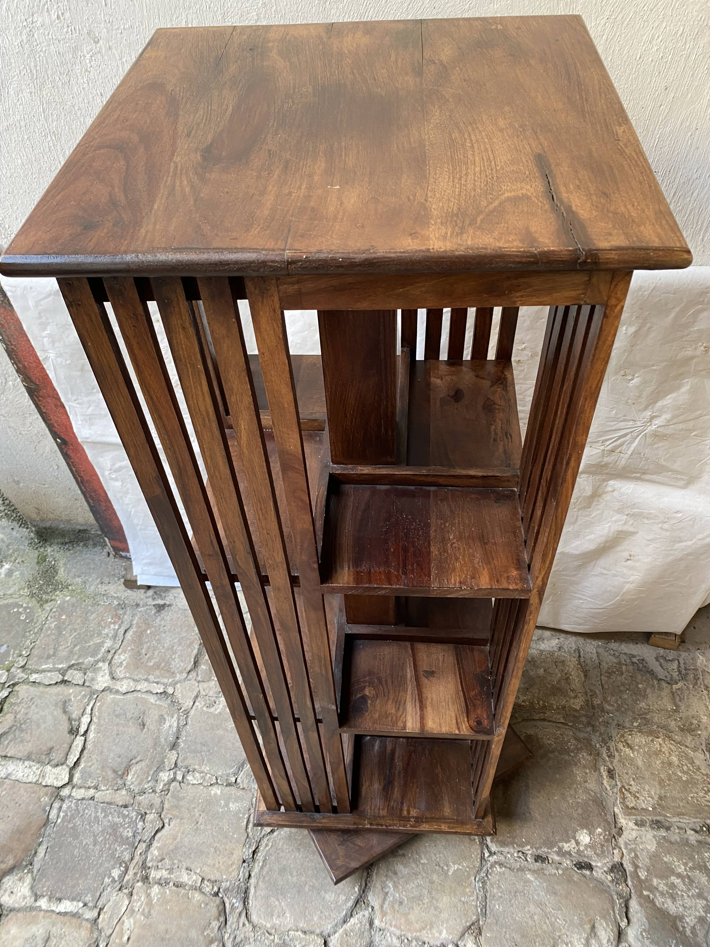 Pivoting column library in mahogany, 20th century.
