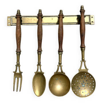 Brass kitchen utensil set, wall mountedwith wooden handles, French vin