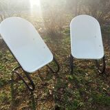 Pair of designer armchairs
