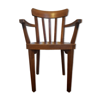 Wooden armchair with armrests