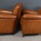 Paire de fauteuils club en cuir