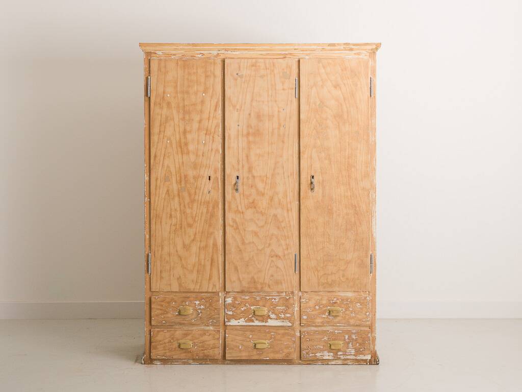 Solid pine cabinet fully stripped consisting of 3 doors and 6 drawers