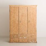 Solid pine cabinet fully stripped consisting of 3 doors and 6 drawers