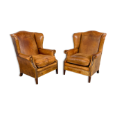 Ensemble de deux fauteuils à dos ailé en cuir de mouton Delft
