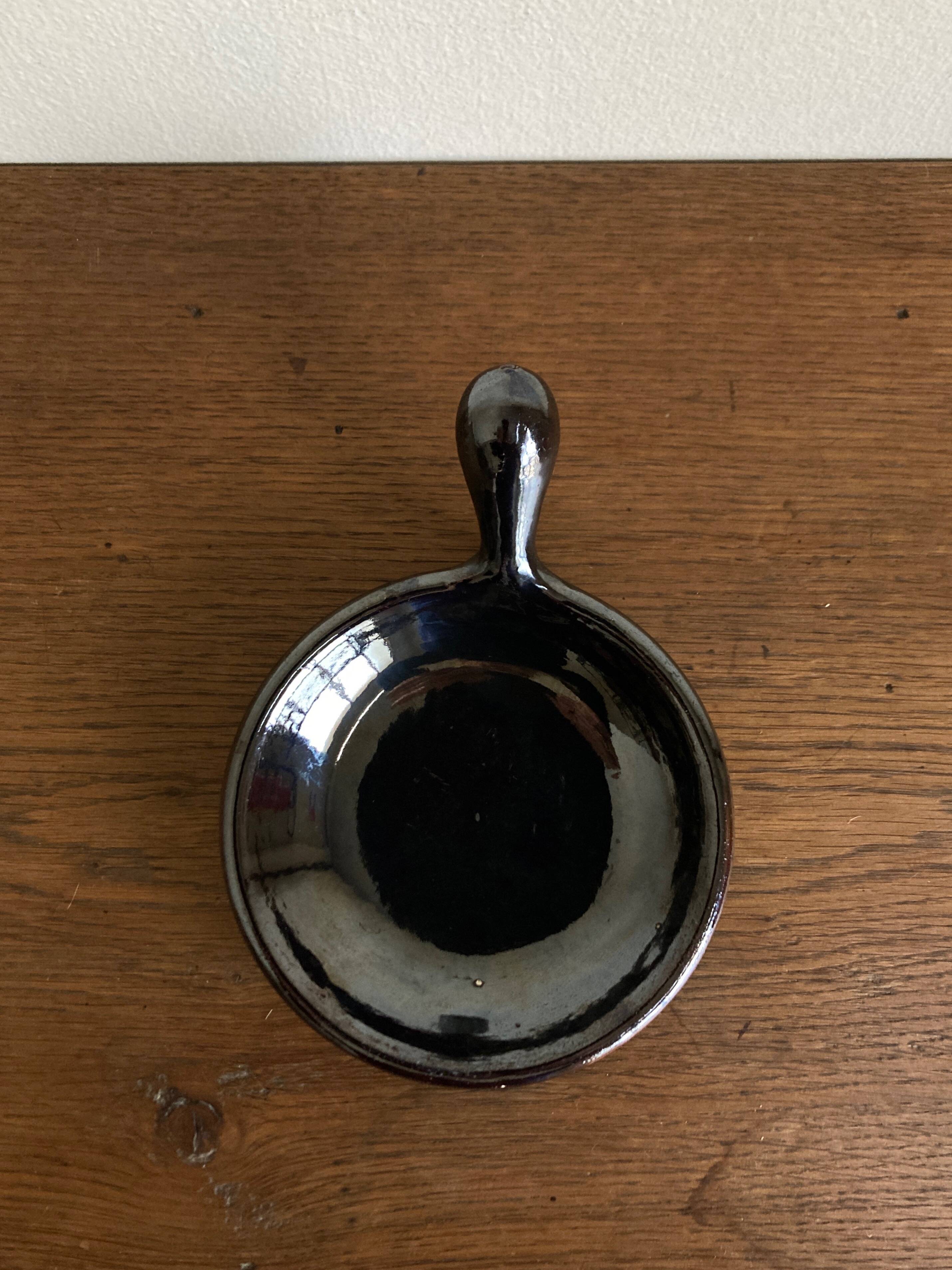 Black glazed earthenware dish 1960