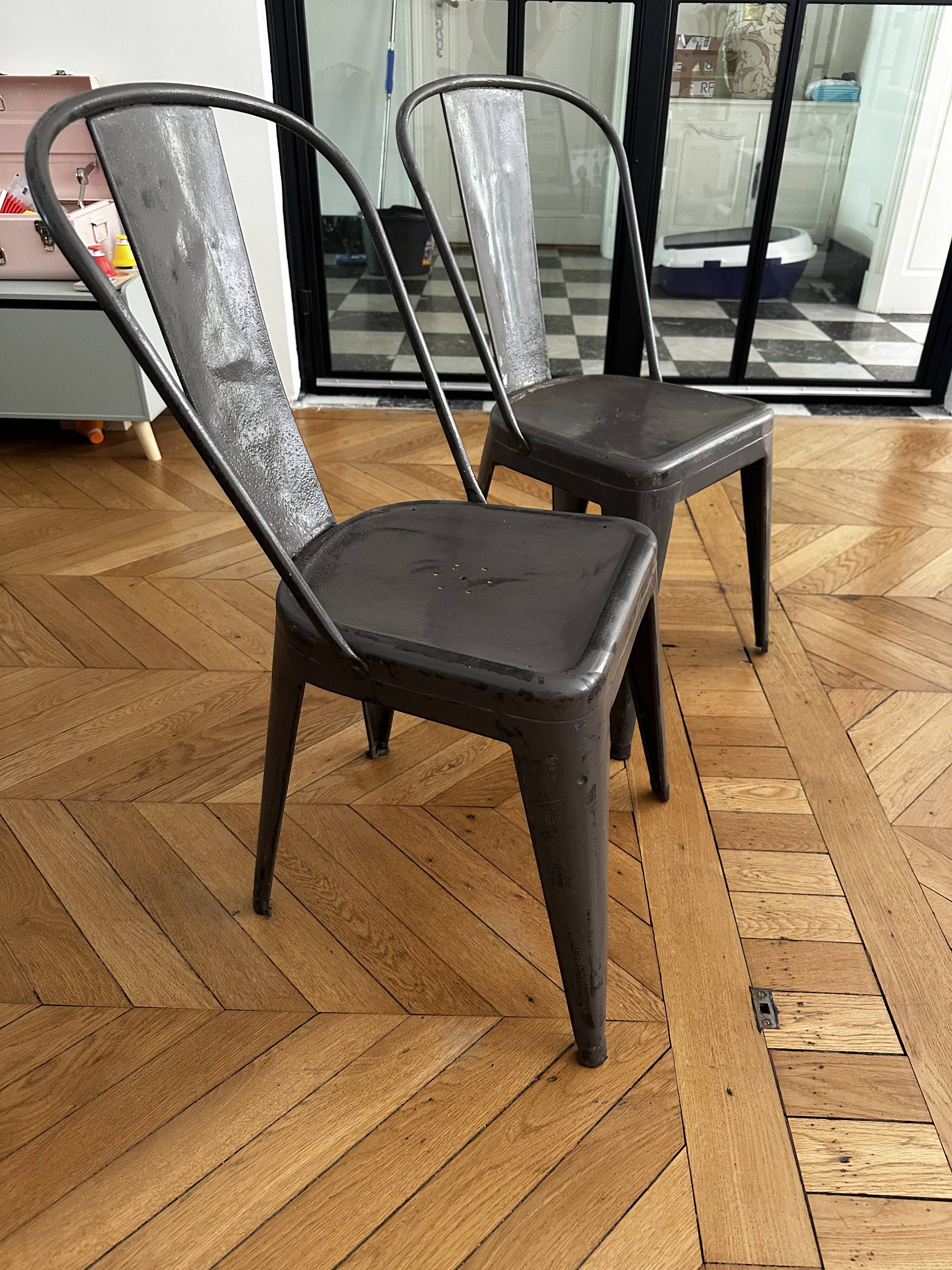 Pair of vintage Tolix model A chairs, designed by Xavier Pauchard.