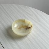 Marbled onyx pocket emptier