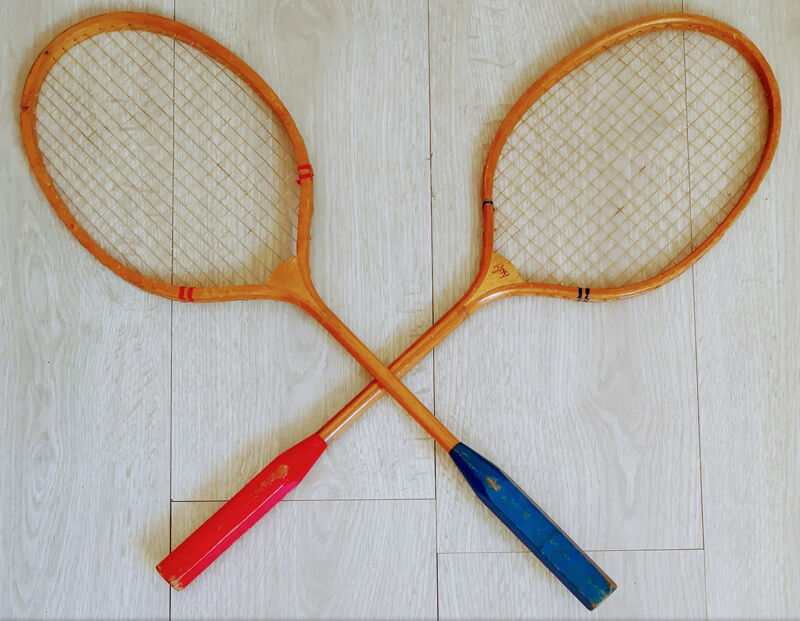 Pair of old wooden badminton rackets