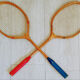 Pair of old wooden badminton rackets