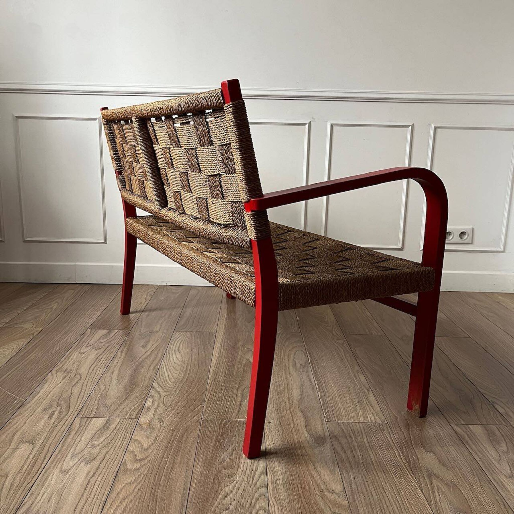 Vintage bench in red wood and rope