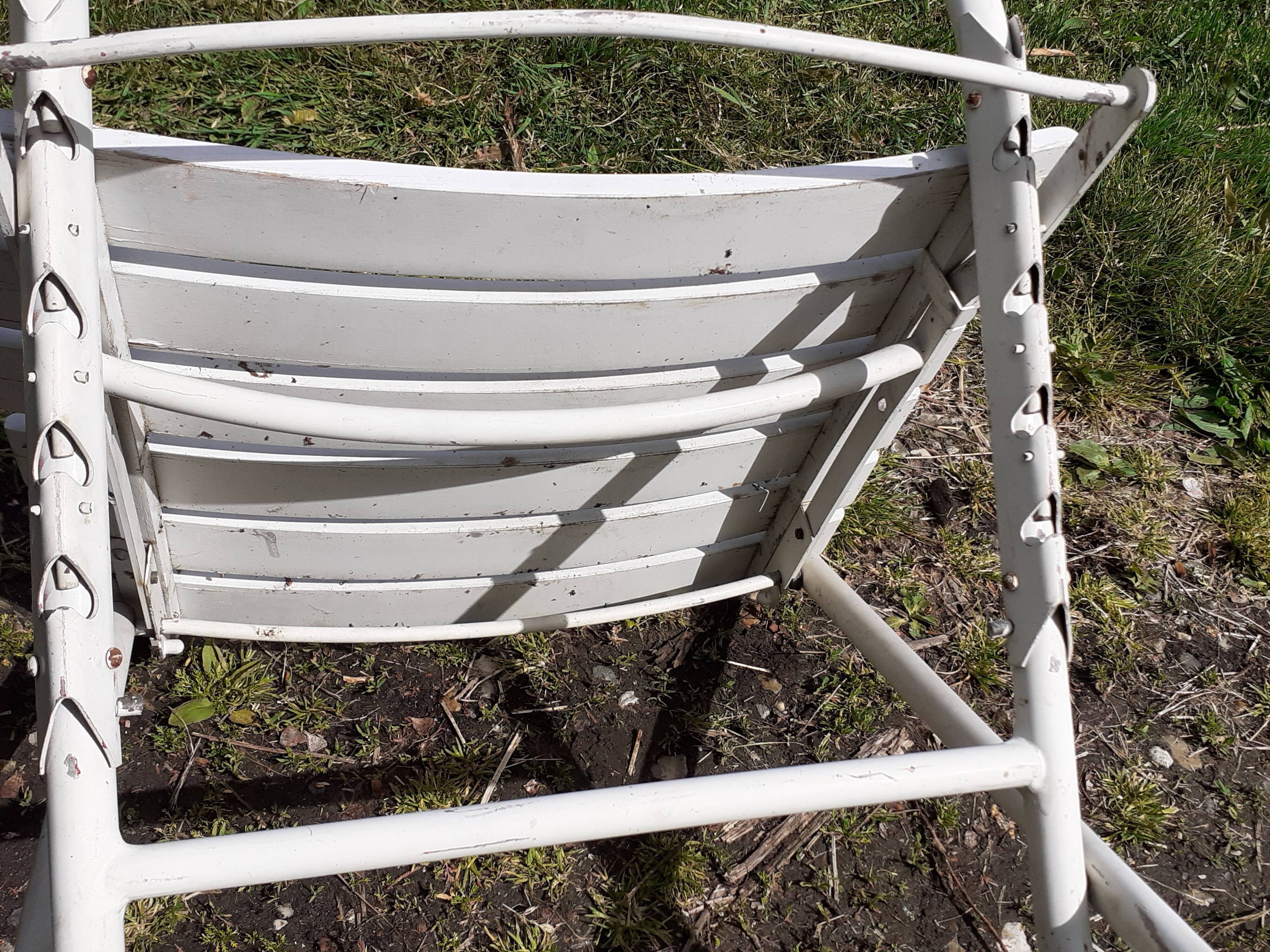 Pair of iron and old wood garden chairs
