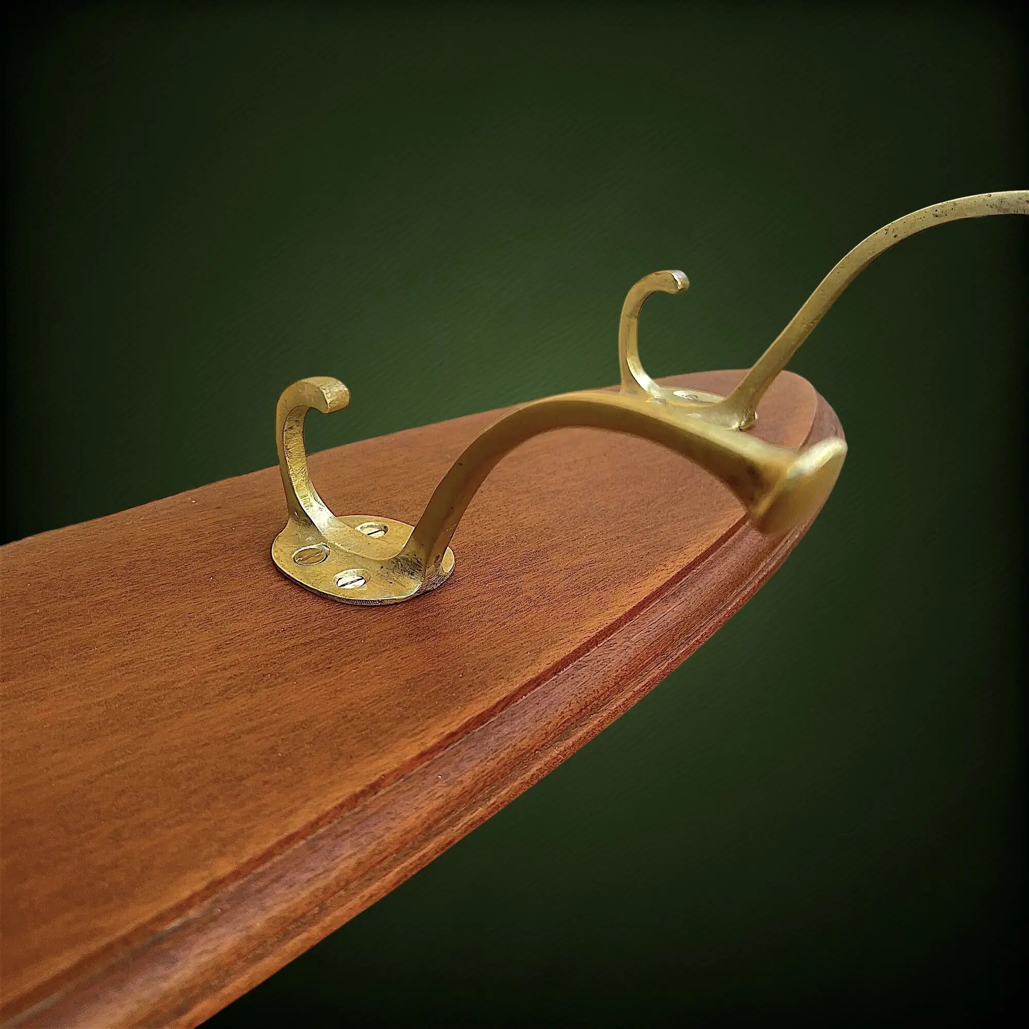 Vintage wooden wall coat rack with 4 double brass hooks – 1950s-60s