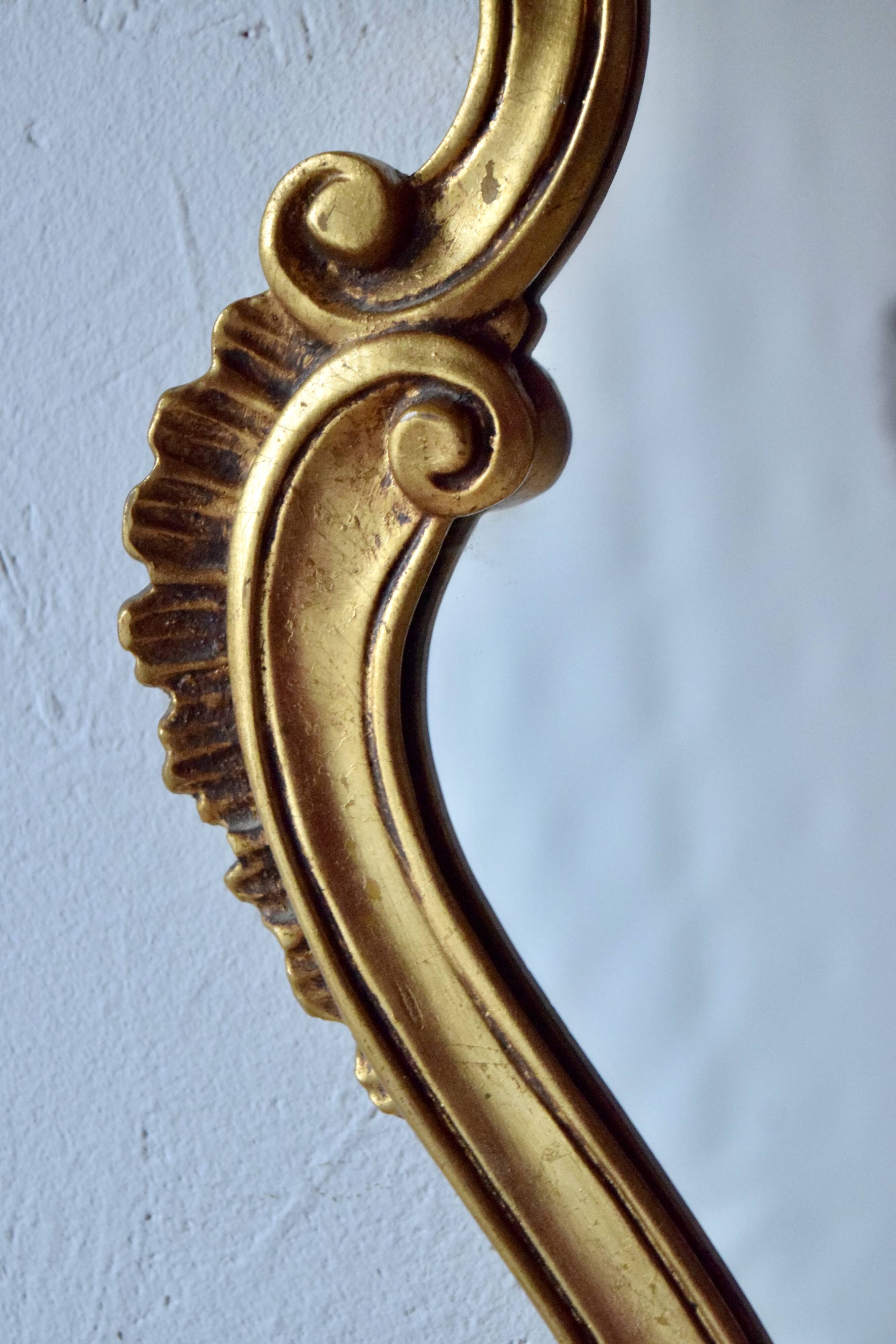 Old wall mirror in golden resin - rococo style
