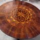 Round "Sorrentino" gueridon inlaid with a rosette design.