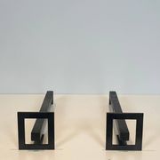 Paire de chenets modernistes en acier et fer forgé
